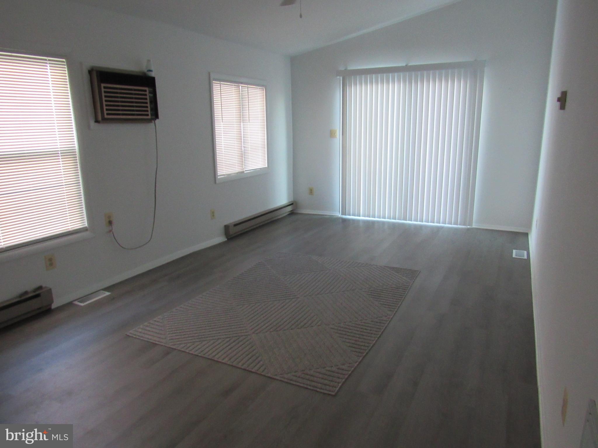 1015 Cold Spring Road Middle River, MD 21220 - Photo 8 of 28 an empty room with windows