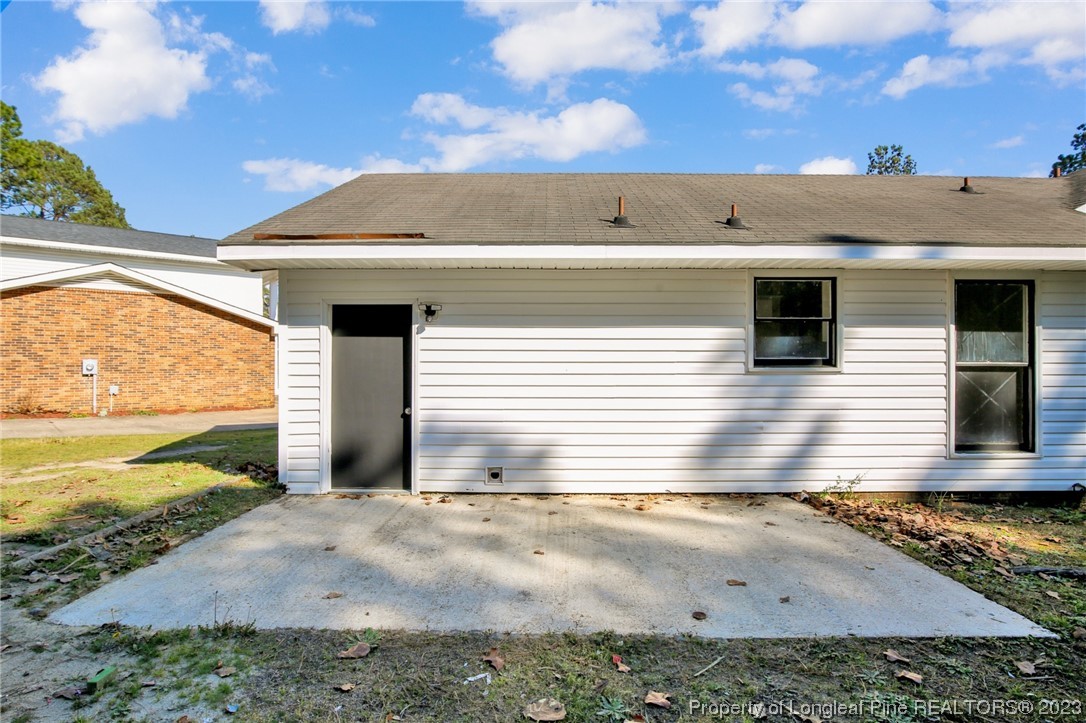 3319 Hedgemoor Circle Spring Lake, NC 28390 - Photo 25 of 30 a view of a house with a yard