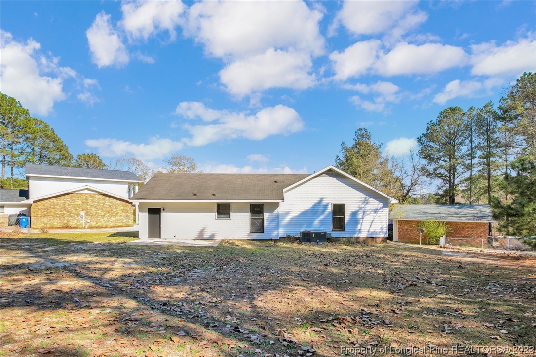 3319 Hedgemoor Circle Spring Lake, NC 28390 - Photo 26 of 30 a view of a house with a big yard