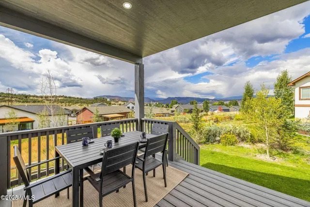 a view of a balcony with lake view and mountain view
