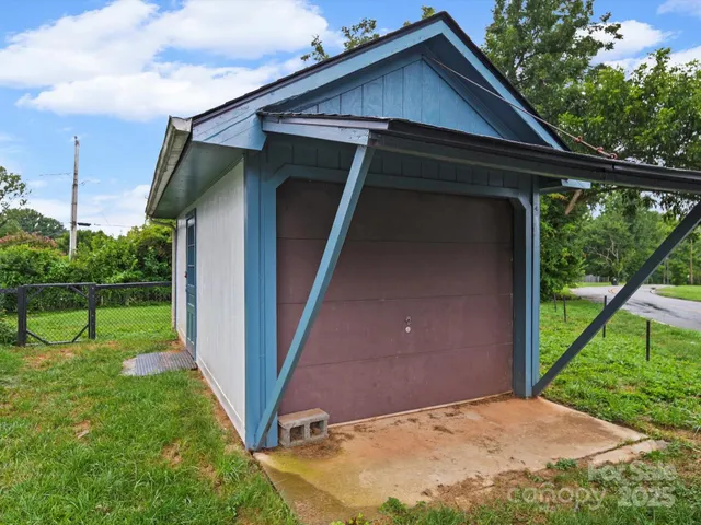 a view of backyard with green space