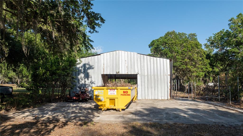 5160 Haywood Ruffin Road St. Cloud, FL 34771 - Photo 36 of 39 a view of a house with a swimming pool