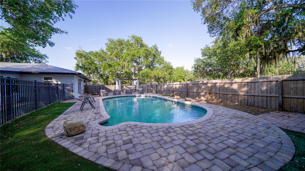 5160 Haywood Ruffin Road St. Cloud, FL 34771 - Photo 5 of 39 a view of a backyard with tree s