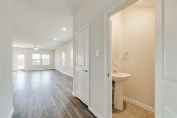 a view of entryway with wooden floor