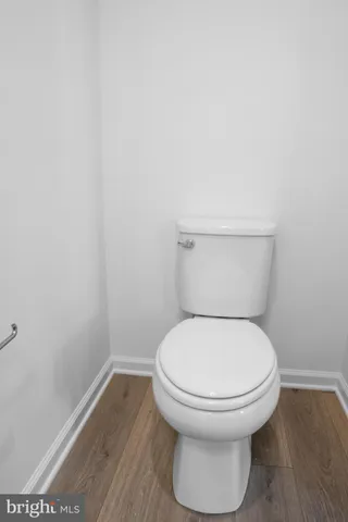a bathroom with a toilet and a sink