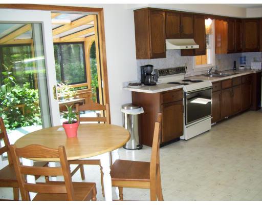 20 Holden Road Sterling, MA 01564 - Photo 6 of 12 a kitchen with stainless steel appliances granite countertop a stove a sink and a microwave