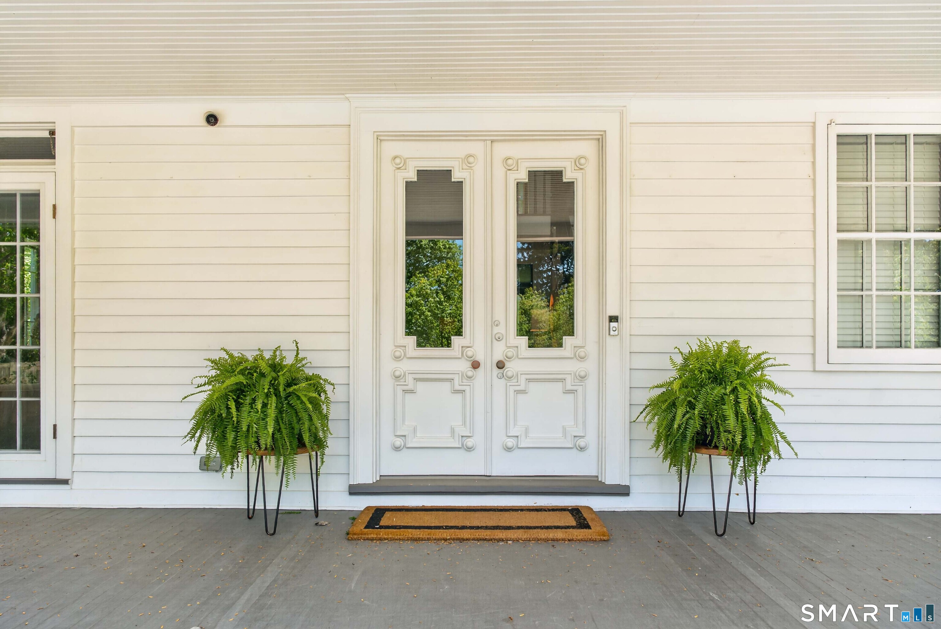 100 North Main Street Kent, CT 06757 - Photo 9 of 40 a view of front door with potted plants