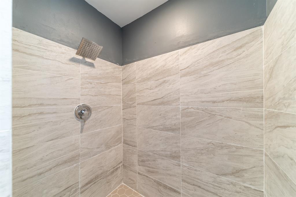 6345 Hatcher Road Lakeland, FL 33811 - Photo 13 of 41 a bathroom with a shower