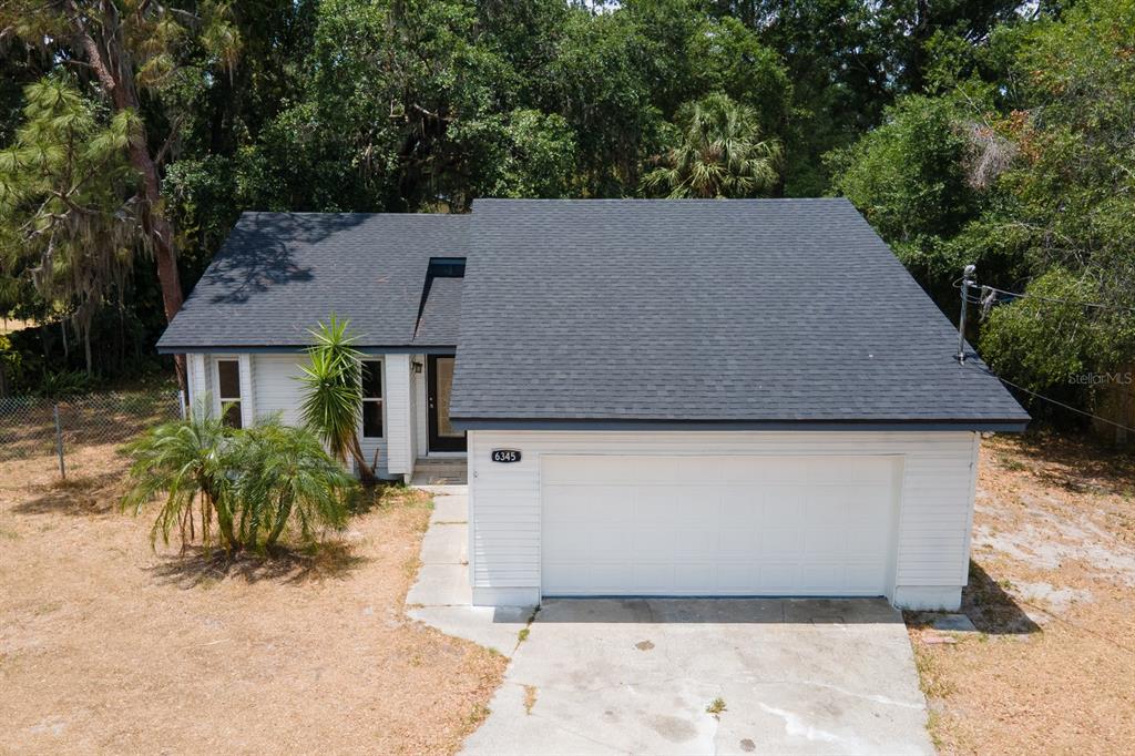 6345 Hatcher Road Lakeland, FL 33811 - Photo 30 of 41 a aerial view of a house with a yard