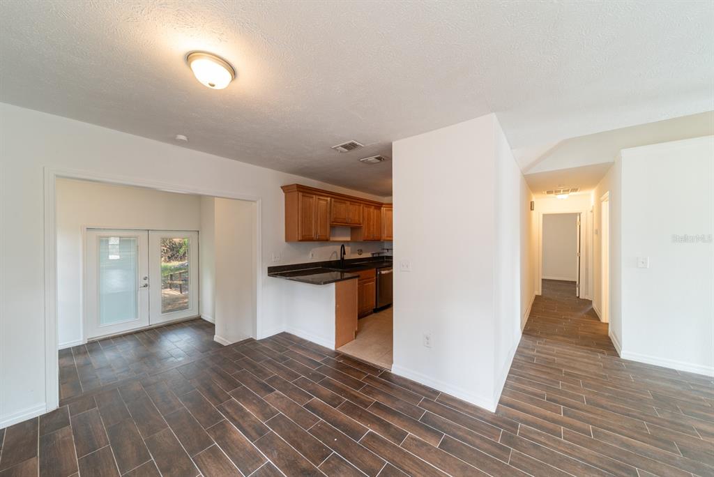 6345 Hatcher Road Lakeland, FL 33811 - Photo 3 of 41 a view of a kitchen from the hallway