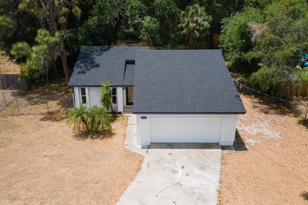 6345 Hatcher Road Lakeland, FL 33811 - Photo 31 of 41 an aerial view of a house with a yard