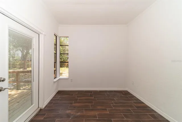 a view of an empty room and window