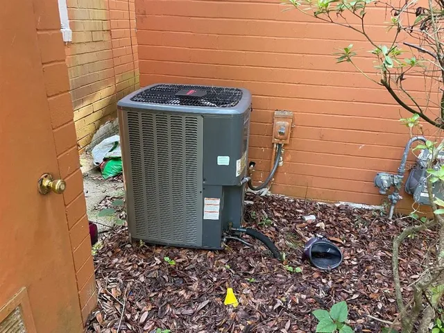 a spacious bedroom with a bed and a dresser