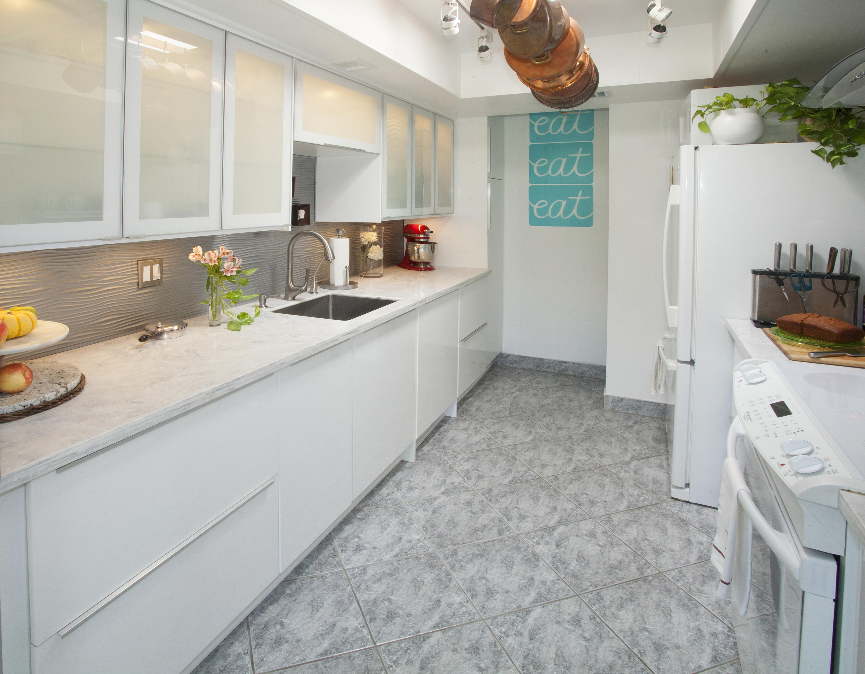 1111 Ramon Road, Unit 88 Palm Springs, CA 92264 - Photo 14 of 24 a kitchen with a sink a stove and cabinets