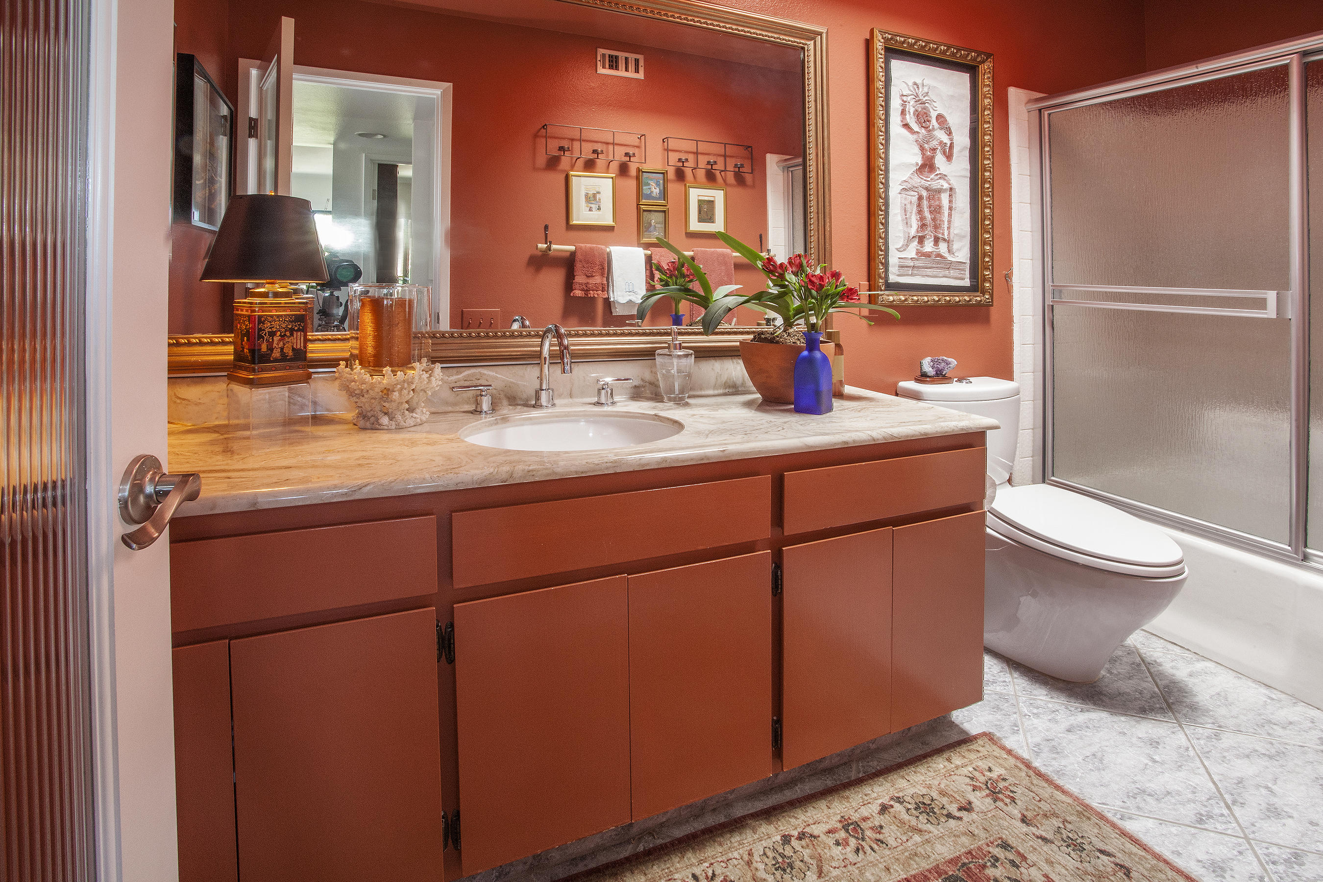 1111 Ramon Road, Unit 88 Palm Springs, CA 92264 - Photo 17 of 24 a bathroom with a sink a toilet and mirror