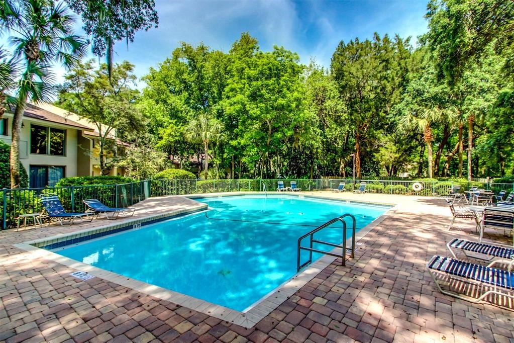 3033 Sea Marsh Road Fernandina Beach, FL 32034 - Photo 30 of 37 a view of a swimming pool with a patio