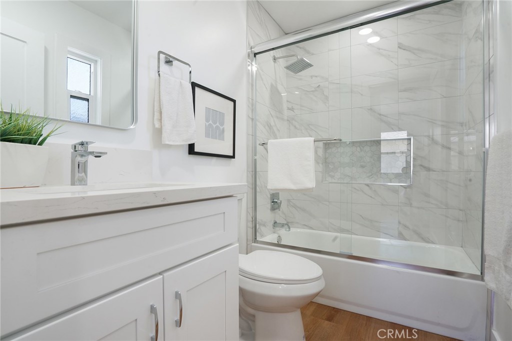 5626 Lenore Avenue Arcadia, CA 91006 - Photo 11 of 23 a bathroom with a sink toilet and shower
