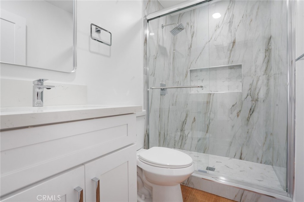 5626 Lenore Avenue Arcadia, CA 91006 - Photo 12 of 23 a bathroom with a sink a toilet and shower