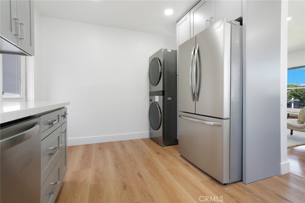 5626 Lenore Avenue Arcadia, CA 91006 - Photo 7 of 23 a view of a kitchen with a refrigerator and a stove top oven
