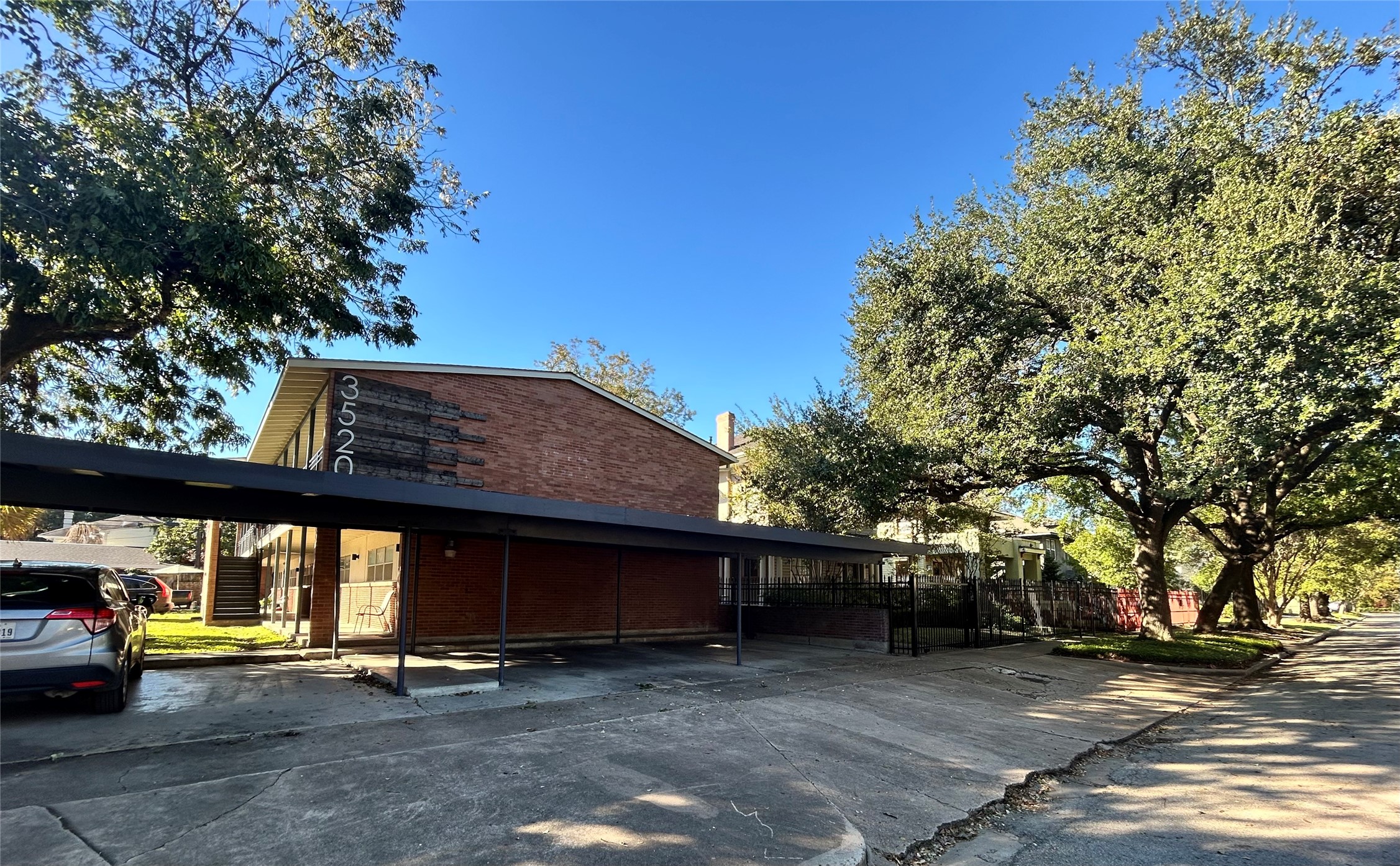 3520 Garrott Street, Unit 2 Houston, TX 77006 - Photo 14 of 14 a view of a car park in front of a house