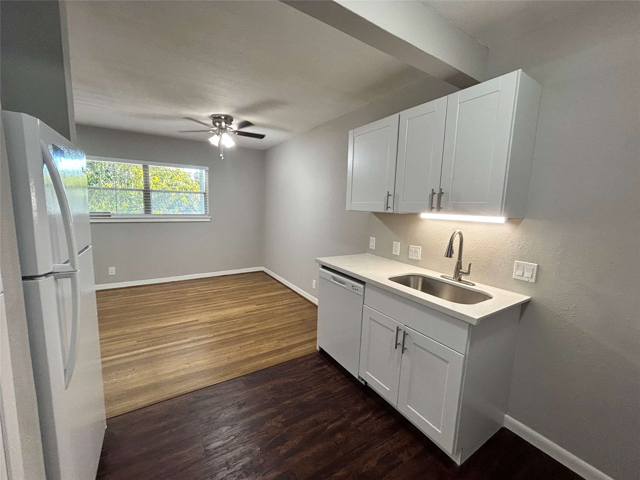 3520 Garrott Street, Unit 2 Houston, TX 77006 - Photo 3 of 14 a room with a sink cabinets and wooden floor