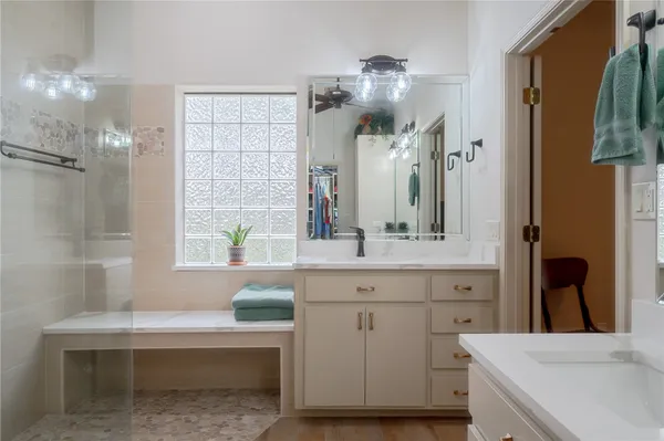 a bedroom with a bed and a cabinets