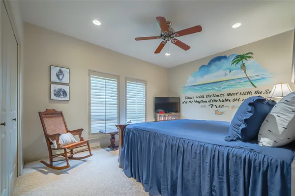 a bathroom with a sink a mirror and a shower