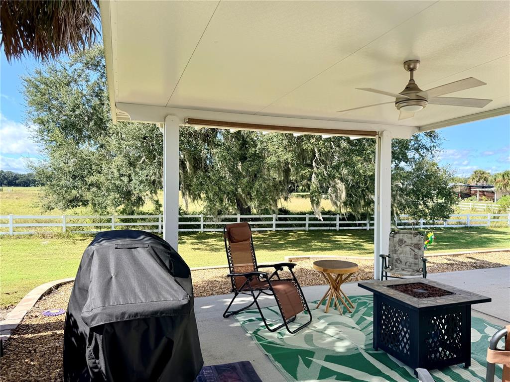 9588 Southeast 47th Way Webster, FL 33597 - Photo 12 of 43 a view of swimming pool with outdoor seating
