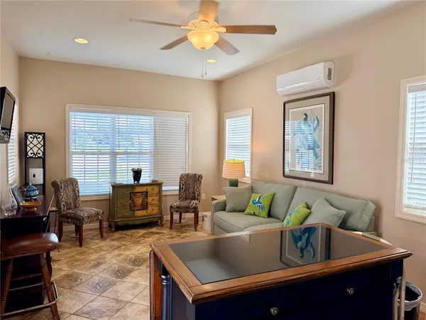 a living room with furniture and a window