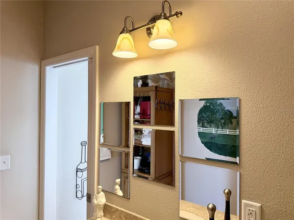 a view of a bathroom with a tub and shower