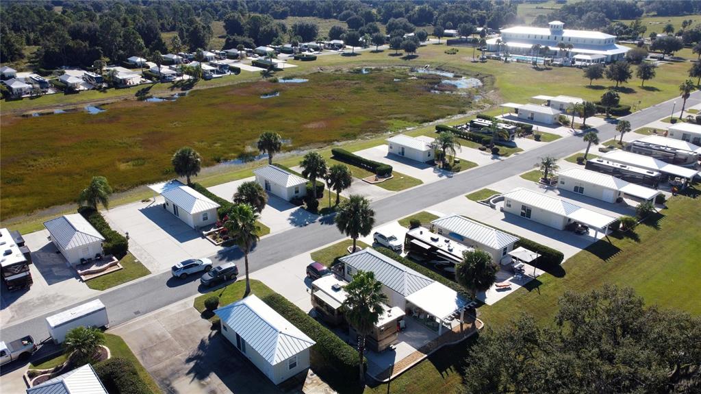 9588 Southeast 47th Way Webster, FL 33597 - Photo 27 of 43 an aerial view of residential houses with outdoor space