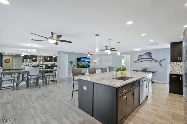 a kitchen with a stove and cabinets