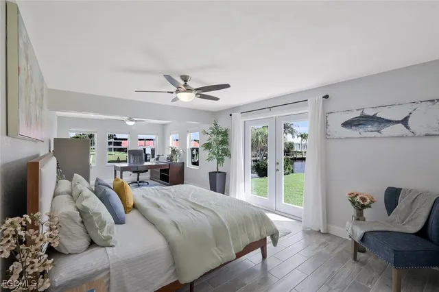 a bed room with a bed window and a chair