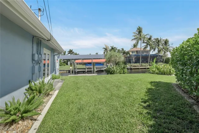a house view with a garden space