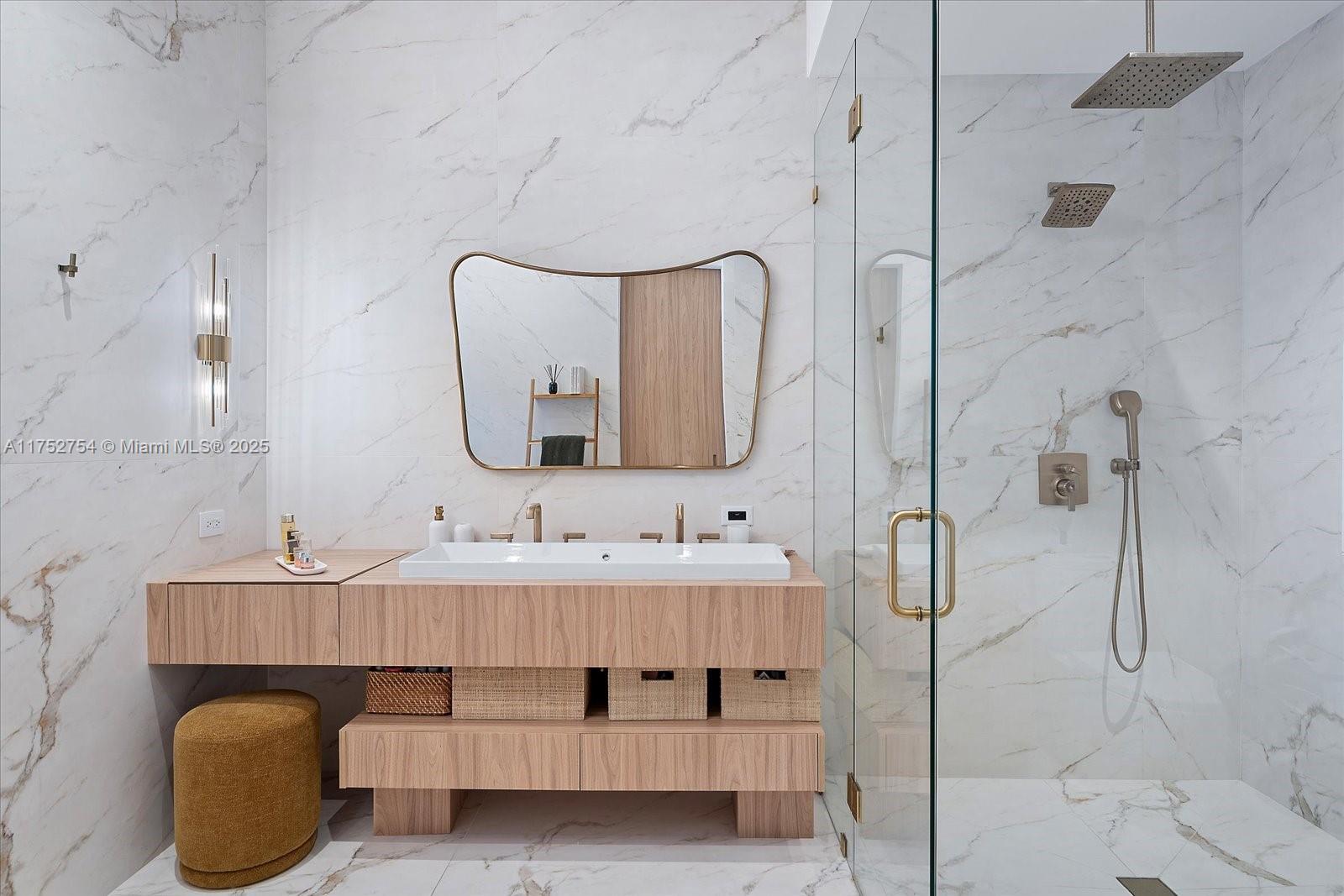 900 Brickell Key Boulevard, Unit 1604 Miami, FL 33131 - Photo 20 of 49 a bathroom with a double vanity sink mirror and double