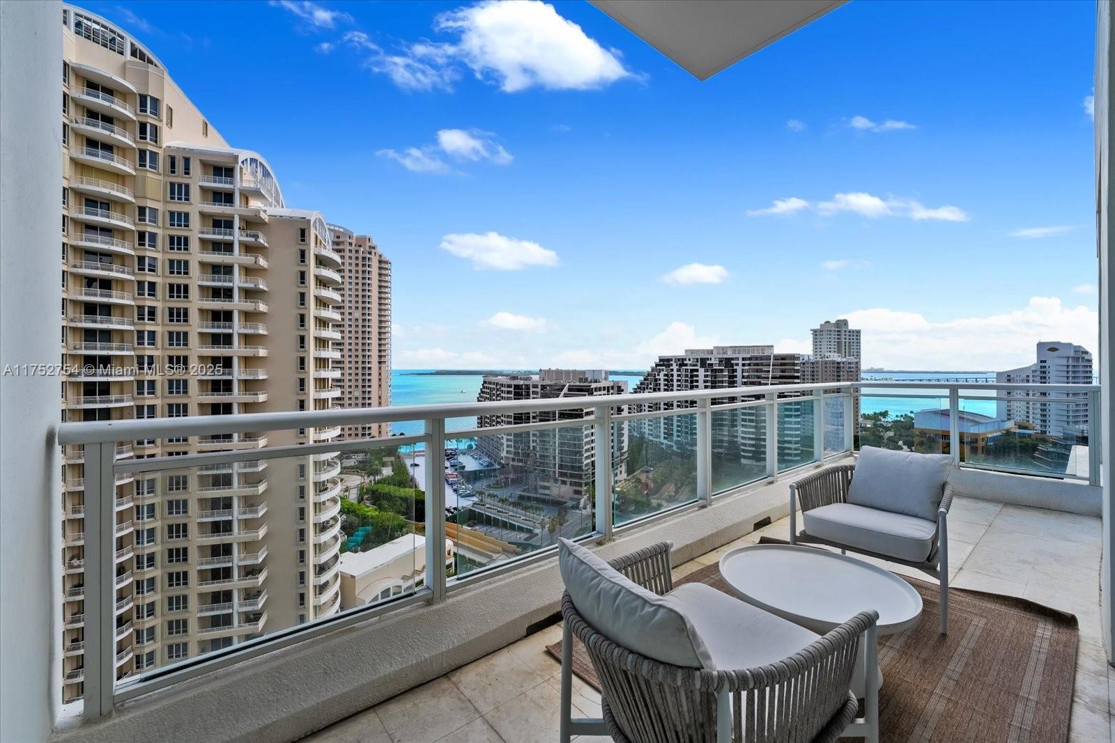 900 Brickell Key Boulevard, Unit 1604 Miami, FL 33131 - Photo 27 of 49 a balcony with city view