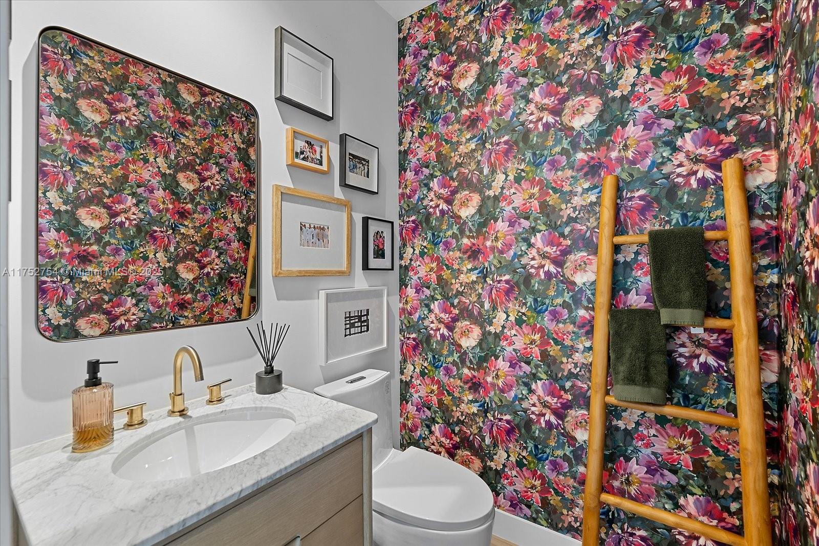 900 Brickell Key Boulevard, Unit 1604 Miami, FL 33131 - Photo 35 of 49 a bathroom with a sink toilet and shower curtain