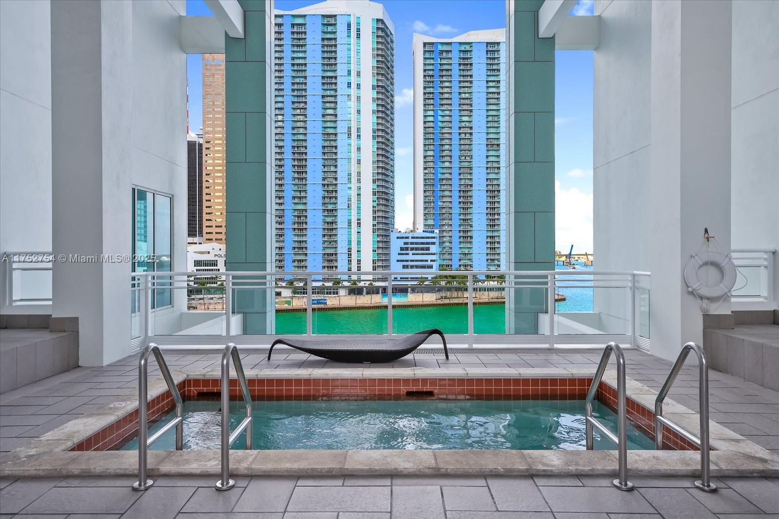900 Brickell Key Boulevard, Unit 1604 Miami, FL 33131 - Photo 42 of 49 a house view with a sitting space