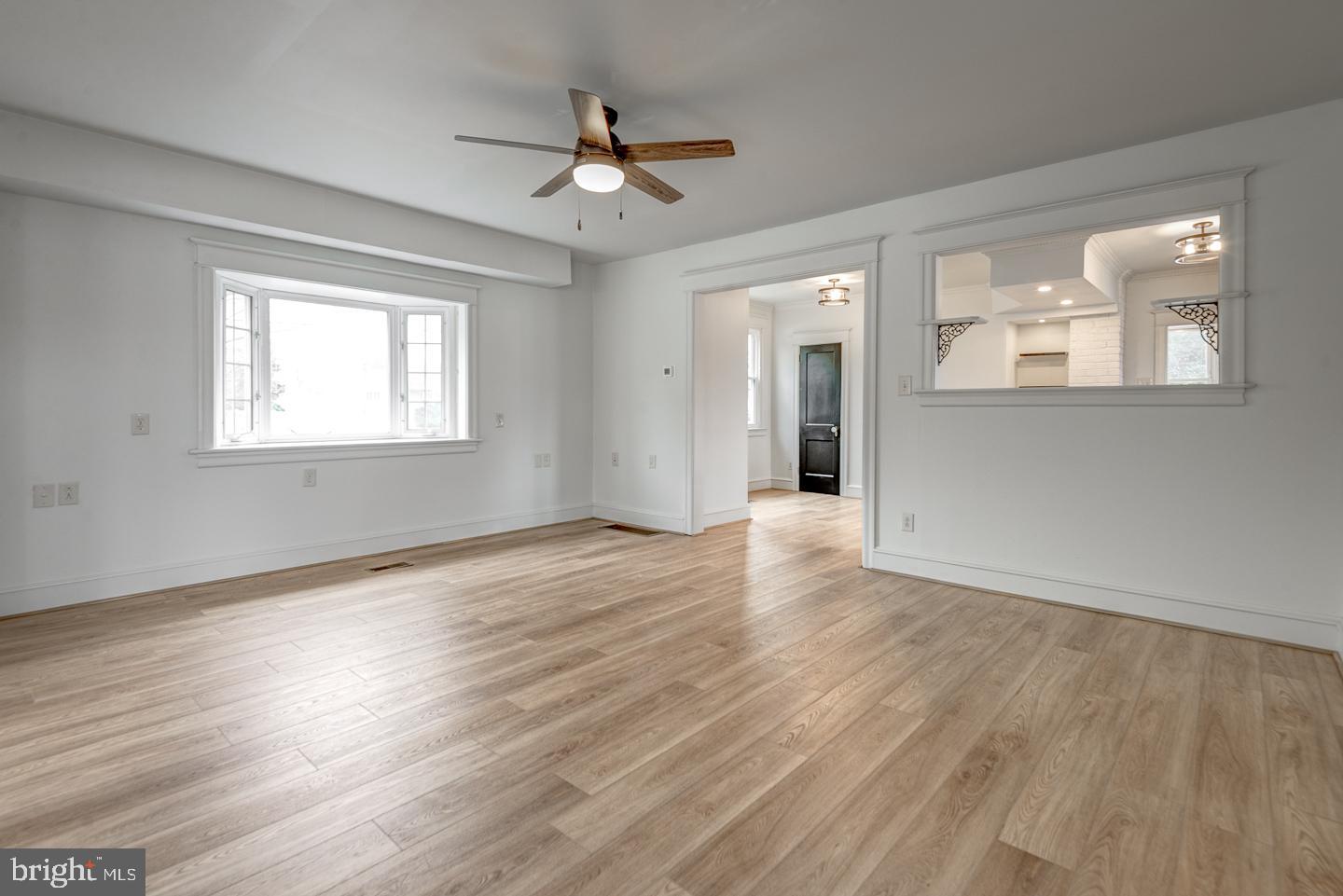 1363 Maple Avenue Croydon, PA 19021 - Photo 13 of 29 a view of an empty room with wooden floor and a window