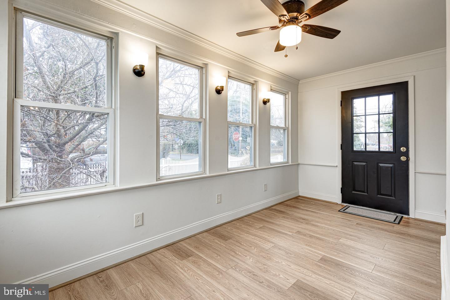 1363 Maple Avenue Croydon, PA 19021 - Photo 16 of 29 a view of an empty room with a window and wooden floor