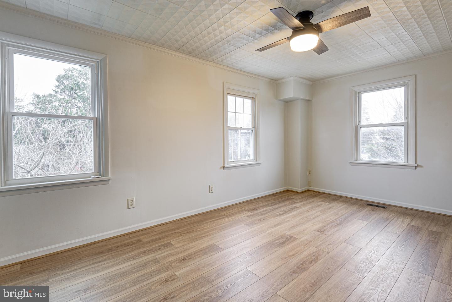1363 Maple Avenue Croydon, PA 19021 - Photo 18 of 29 a view of an empty room with wooden floor and a window
