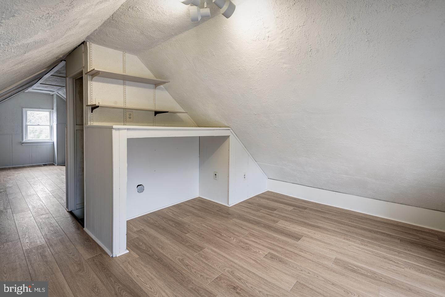 1363 Maple Avenue Croydon, PA 19021 - Photo 23 of 29 wooden floor in an empty room with a window