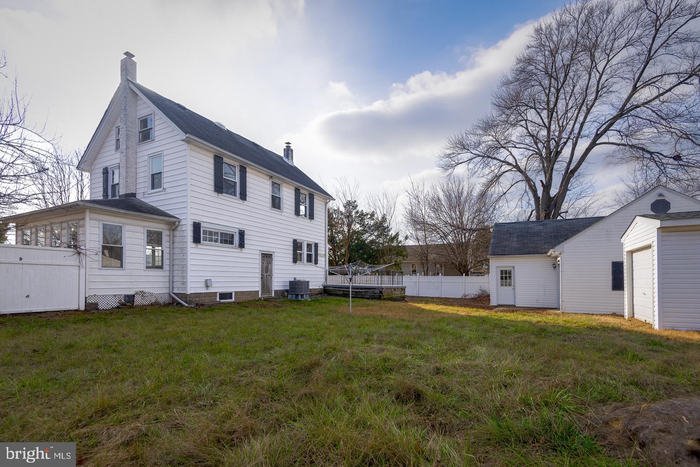 1363 Maple Avenue Croydon, PA 19021 - Photo 28 of 29 a front view of a house with a yard and garage