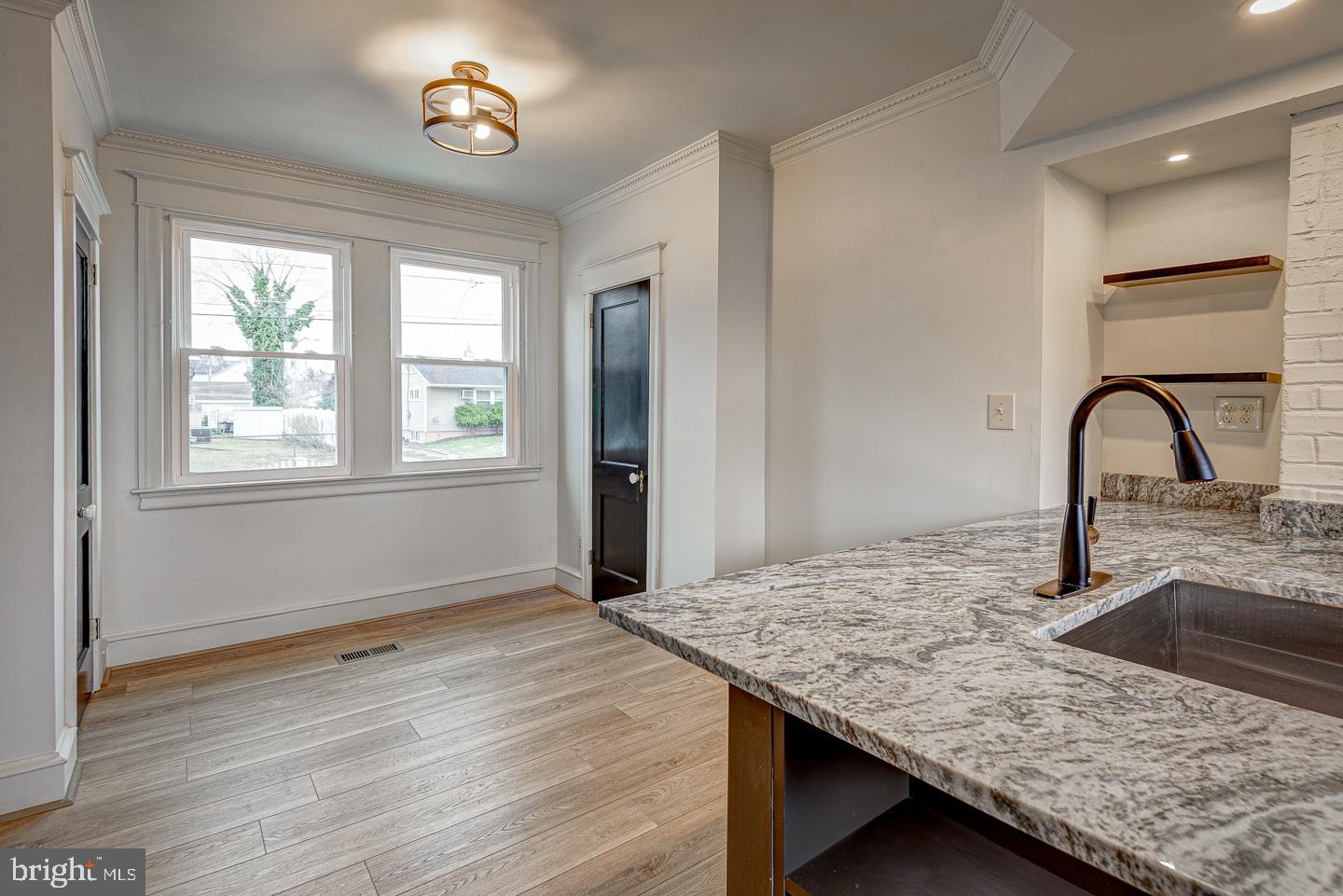 1363 Maple Avenue Croydon, PA 19021 - Photo 5 of 29 a view of a kitchen counter space a sink and wooden floor