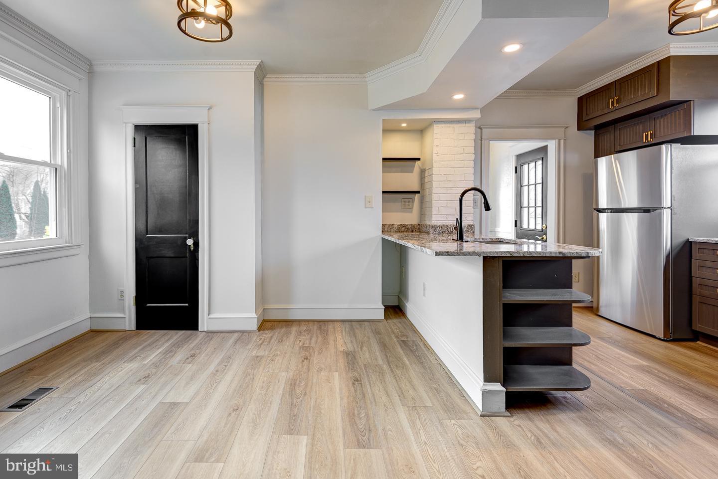 1363 Maple Avenue Croydon, PA 19021 - Photo 8 of 29 a kitchen with stainless steel appliances a refrigerator and a stove top oven