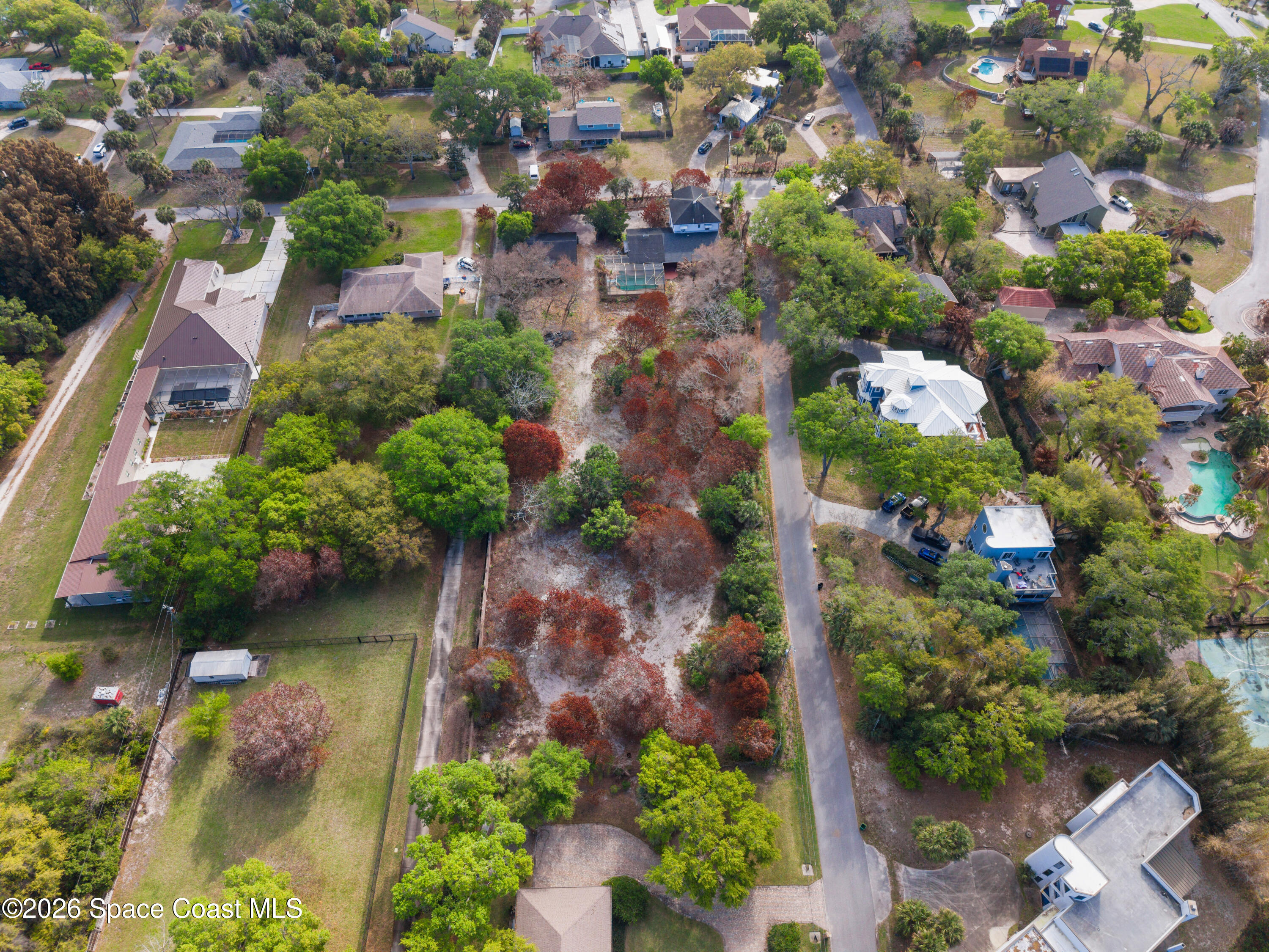 4301 Crooked Mile Road Merritt Island, FL 32952 - Photo 40 of 46 DJI_20260314101919_0062_D