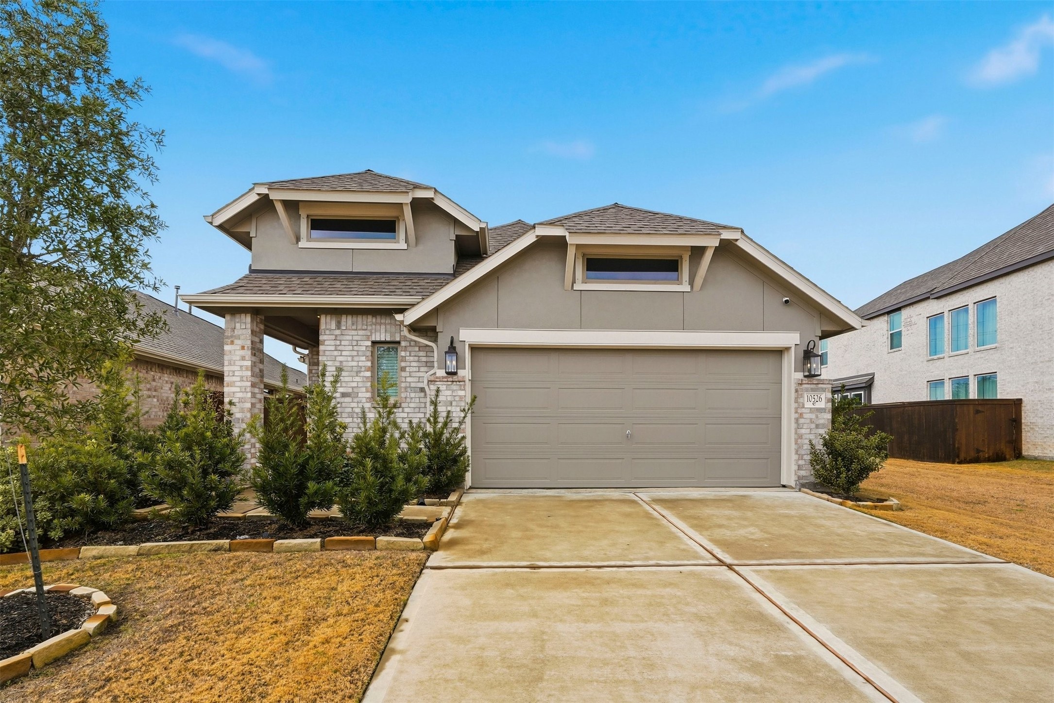 10526 Cabot Trail Rosharon, TX 77583 - Photo 1 of 24 a front view of a house with yard