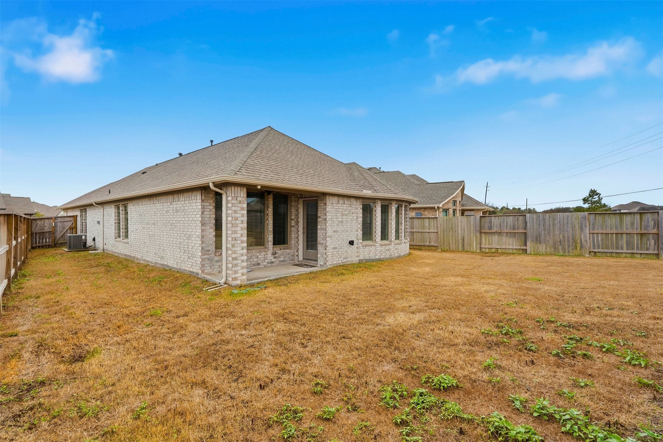 10526 Cabot Trail Rosharon, TX 77583 - Photo 23 of 24 a view of a house with backyard and tree