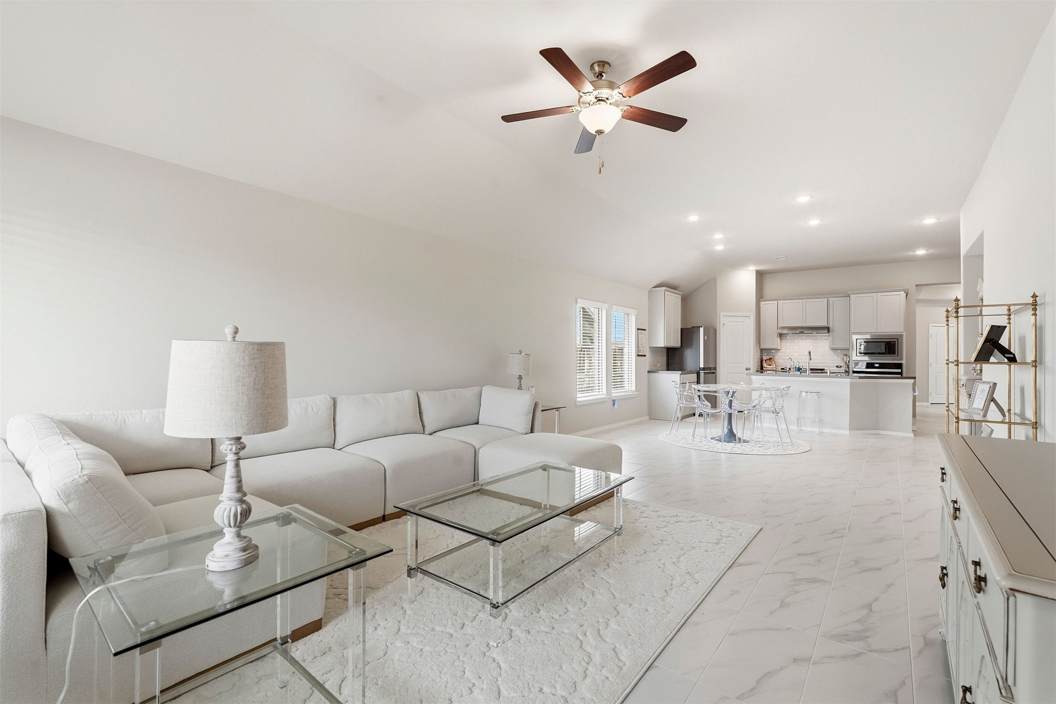 10526 Cabot Trail Rosharon, TX 77583 - Photo 8 of 24 a living room with furniture and kitchen view