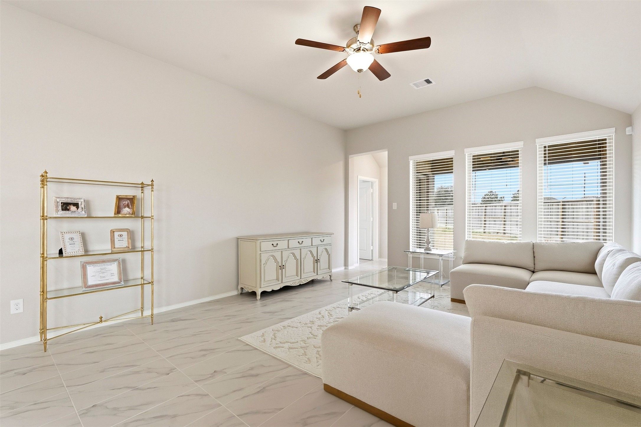 10526 Cabot Trail Rosharon, TX 77583 - Photo 10 of 24 a living room with furniture and a large window